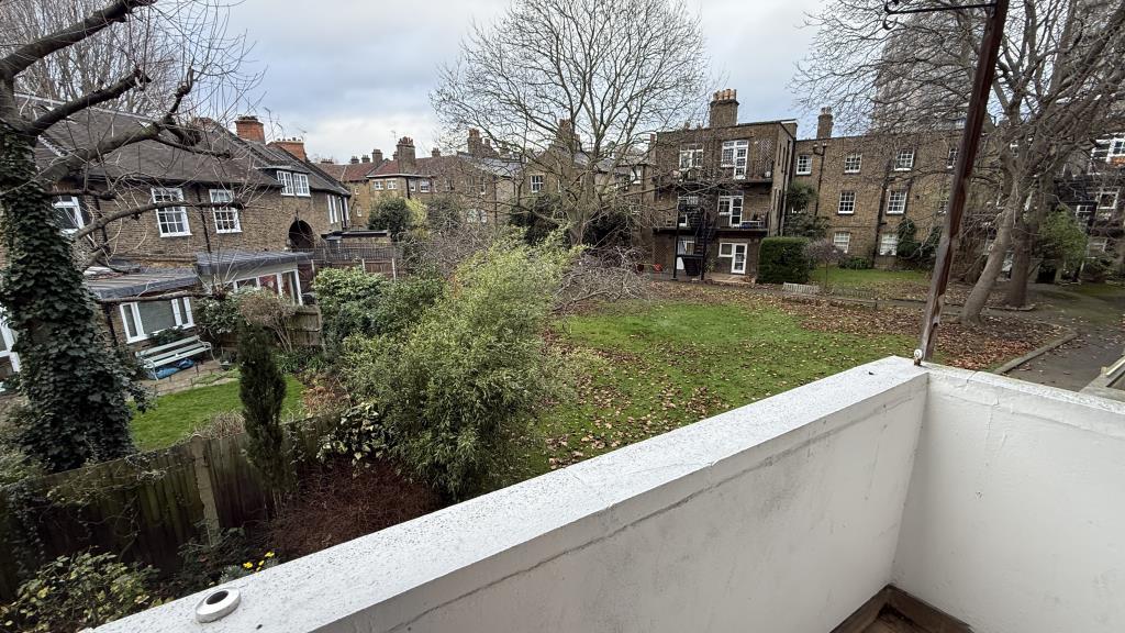 Lot: 127 - LONG LEASE TWO-BEDROOM FLAT FOR INVESTMENT OR OWNER OCCUPATION - External image of balcony view